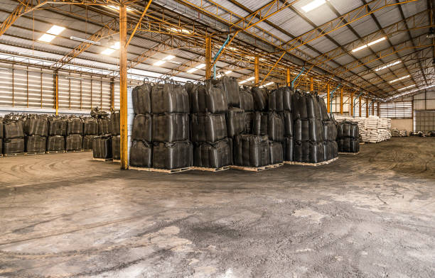 Premium hardwood charcoal stored in dry, sealed bags.